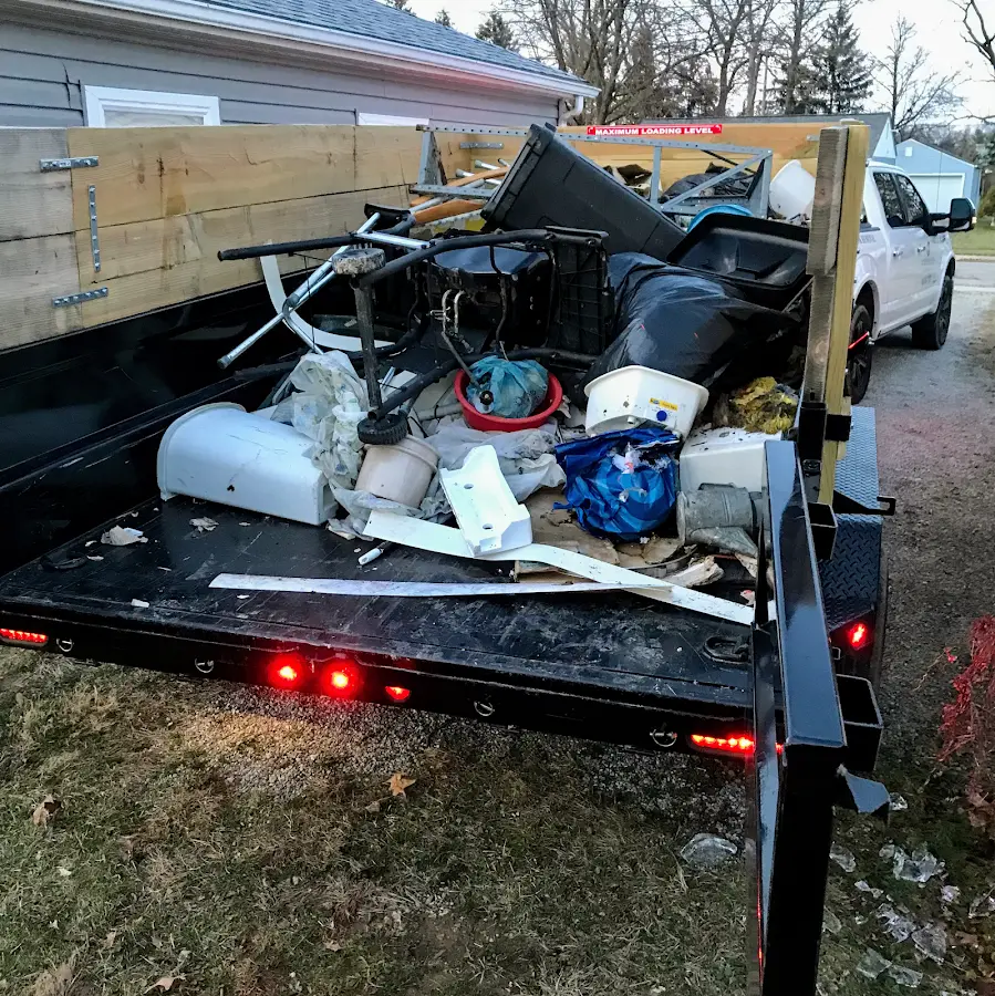 Roll-off dumpster delivered to a residential driveway in Oneonta